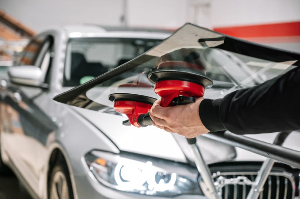 Professional windshield replacement service with new auto glass installation